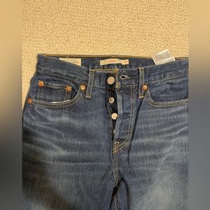 Brand new Levi’s dark blue jeans